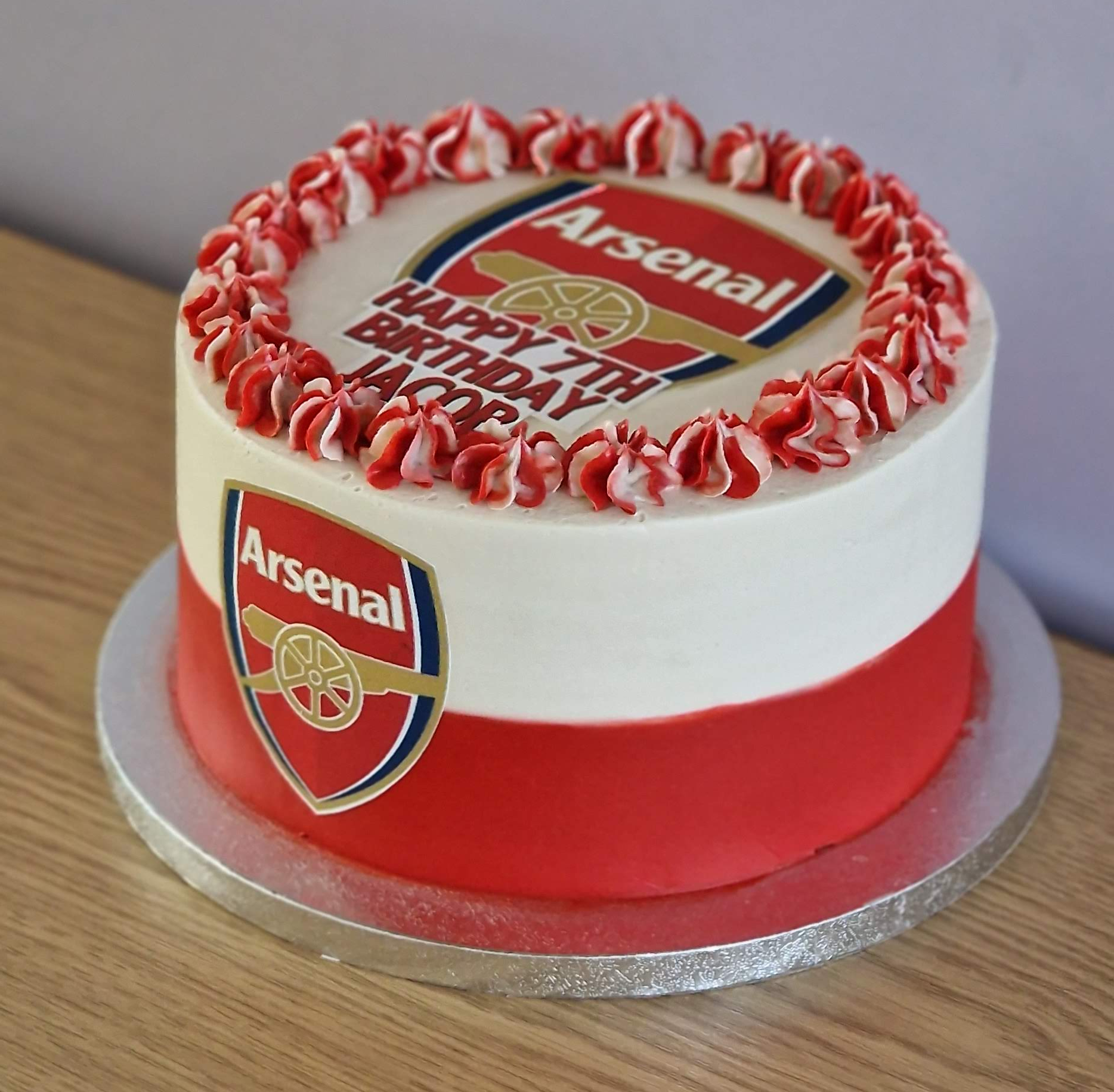 Bespoke tier style Arsenal football club themed birthday cake with red icing curls by Fontaines Fancies